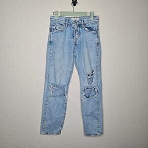 WE the Free light wash distressed baggy jeans button fly women's size 24